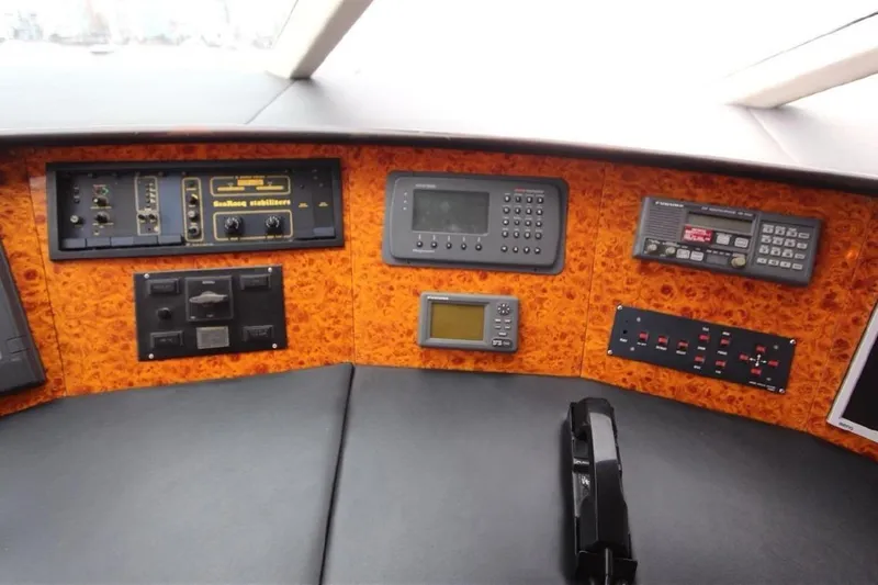  Yacht Photos Pics Control panel of 1987 Lurssen 110 yacht with navigation and communication equipment.