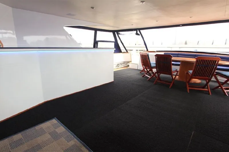  Yacht Photos Pics Luxurious interior of 1987 Lurssen 110 yacht with elegant seating and modern design.