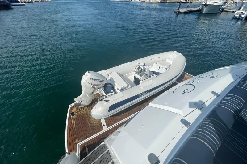 Sea C Yacht Photos Pics Luxury Sunseeker 73 yacht with tender boat on deck, 2012 model.