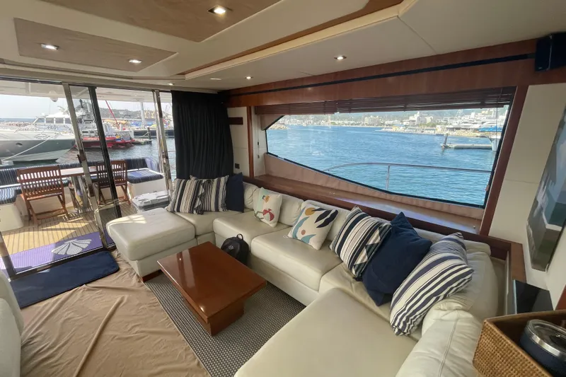 Sea C Yacht Photos Pics Luxurious interior of 2012 Sunseeker 73 yacht with waterfront view and plush seating.