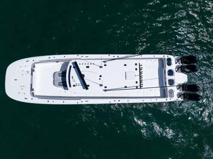  Yacht Photos Pics Overhead view of 2025 Invincible 46 Catamaran on open water.