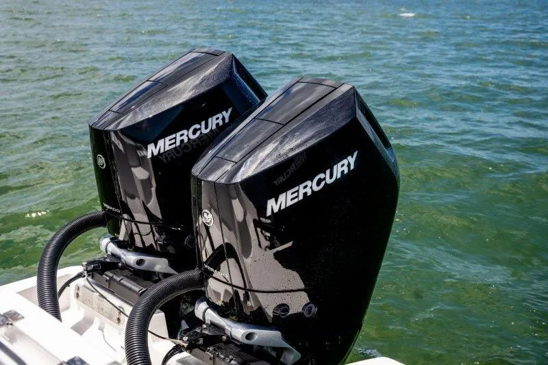  Yacht Photos Pics Twin Mercury outboard engines on a 2025 Invincible 46 Catamaran, cruising on open water.