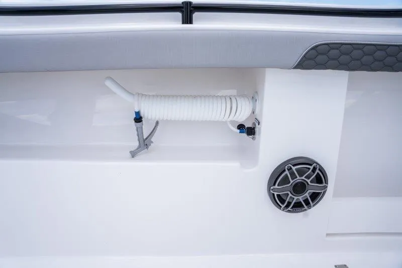  Yacht Photos Pics Coiled hose and speaker on 2025 Invincible 46 Catamaran deck.