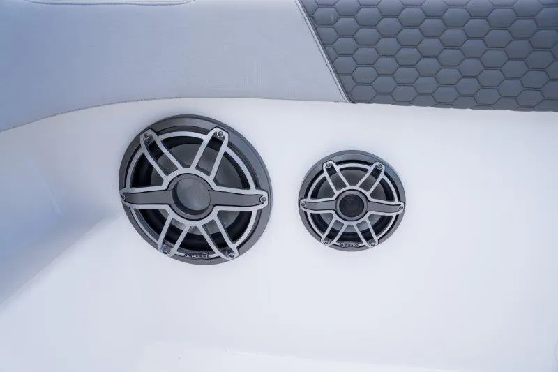  Yacht Photos Pics Speakers on 2025 Invincible 46 Catamaran with hexagonal upholstery detail.