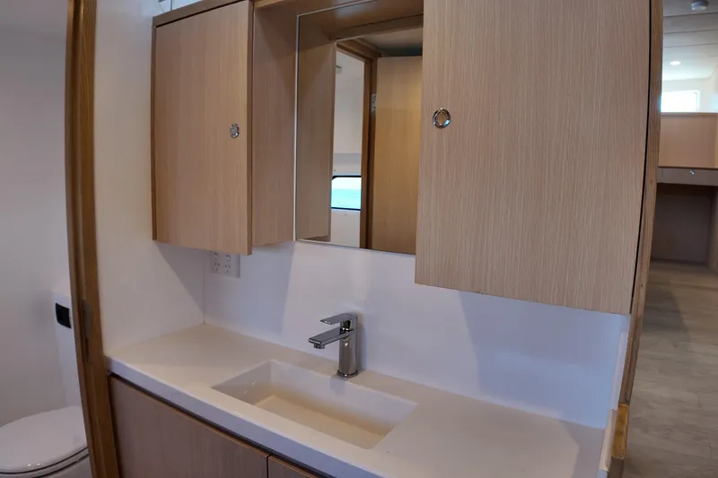  Yacht Photos Pics Modern bathroom vanity in 2026 Longreach 58 yacht, featuring sleek cabinetry and contemporary fixtures.