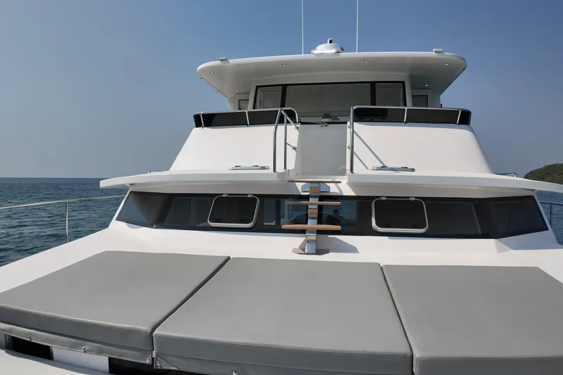  Yacht Photos Pics Luxurious 2026 Longreach 58 yacht with spacious deck and modern design on open sea.