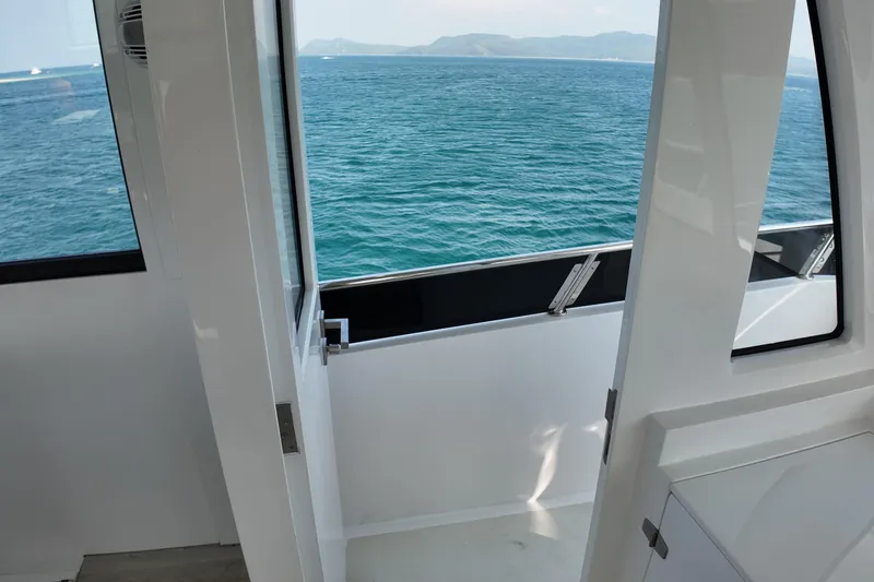  Yacht Photos Pics Interior view of 2026 Longreach 58 yacht overlooking the ocean.