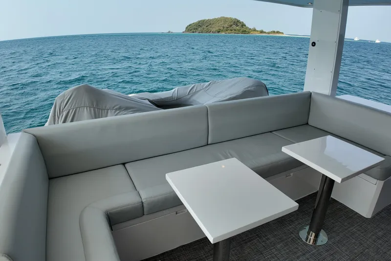  Yacht Photos Pics Luxurious Longreach 58 yacht interior with ocean view, featuring sleek seating and tables, 2026 model.