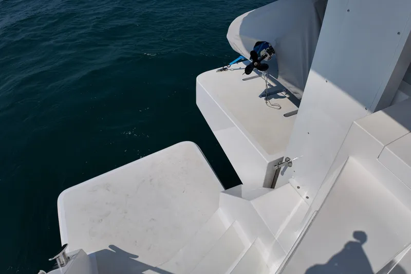  Yacht Photos Pics Longreach 58 yacht deck, 2026 model, overlooking calm ocean waters.