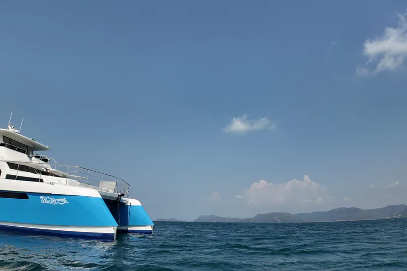  Yacht Photos Pics Modern Longreach 58 catamaran on open sea, clear sky, 2026 model.