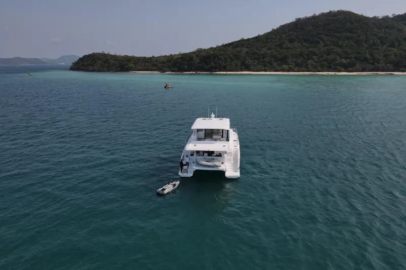  Yacht Photos Pics Longreach 58 yacht anchored near tropical island, 2026 model.