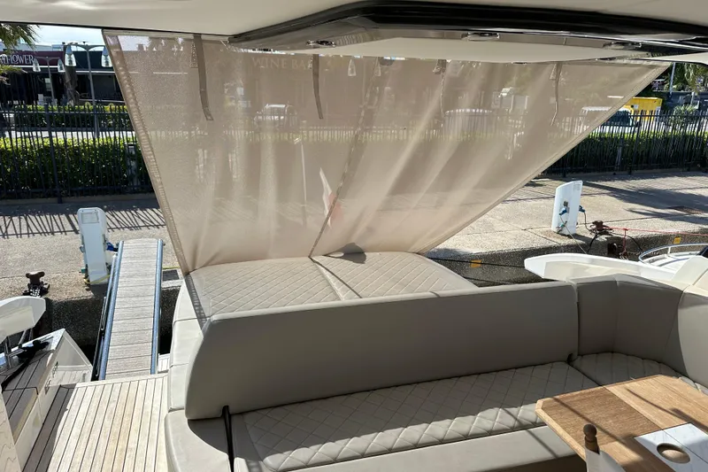  Yacht Photos Pics 2020 Fairline Targa 45 Open yacht interior with sunshade and seating area.