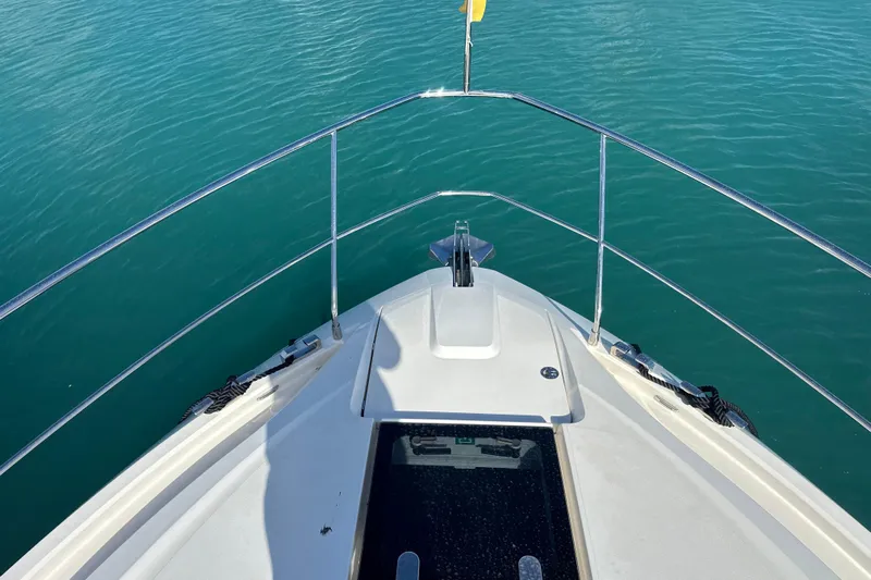  Yacht Photos Pics Bow view of 2020 Fairline Targa 45 Open yacht on calm blue water.
