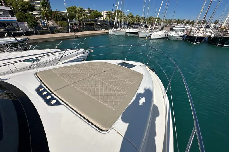  Yacht Photos Pics 2020 Fairline Targa 45 Open yacht docked in a marina, featuring a sunpad.