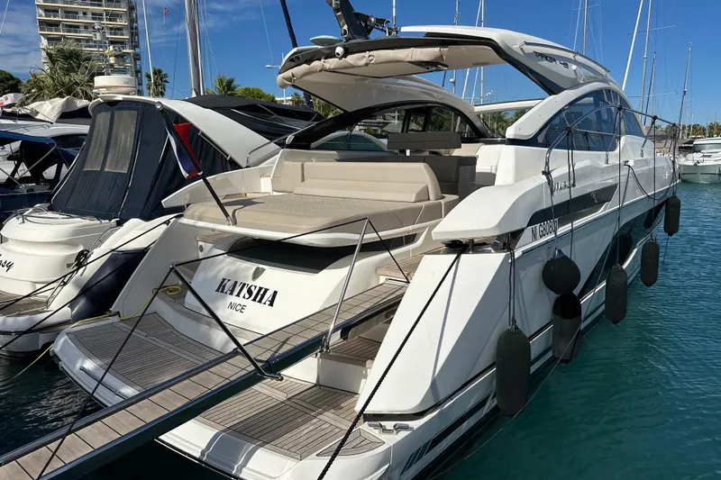  Yacht Photos Pics 2020 Fairline Targa 45 Open yacht docked in marina, sunny day, luxury boat.