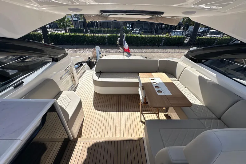  Yacht Photos Pics Luxurious 2020 Fairline Targa 45 Open yacht interior with elegant seating and wooden table.