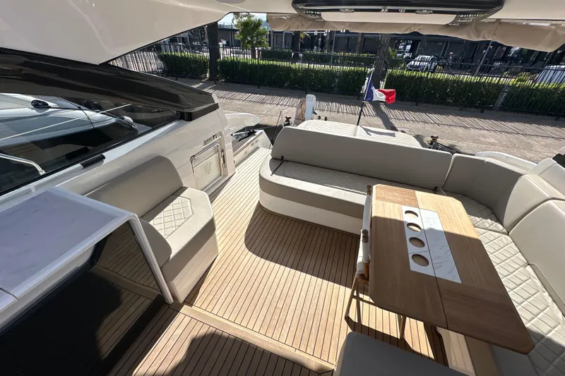  Yacht Photos Pics Luxurious 2020 Fairline Targa 45 Open yacht interior with elegant seating and wooden table.