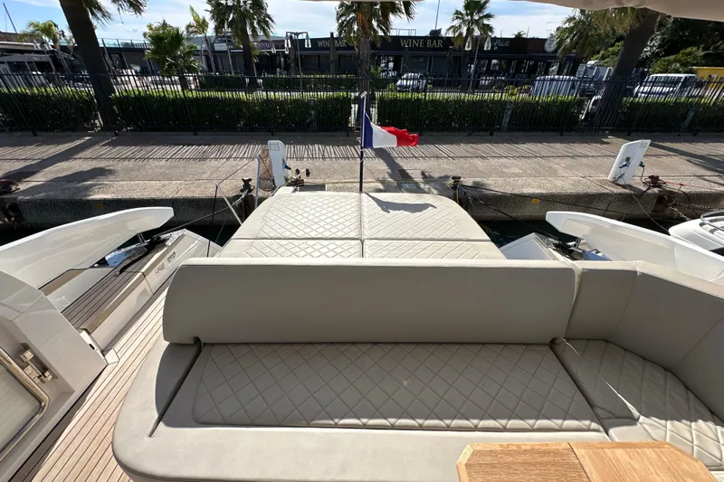  Yacht Photos Pics 2020 Fairline Targa 45 Open yacht with elegant seating and dockside view.