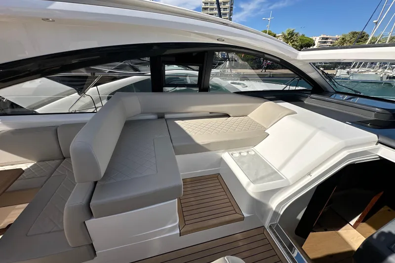  Yacht Photos Pics Luxurious interior of 2020 Fairline Targa 45 Open yacht with elegant seating and wood flooring.
