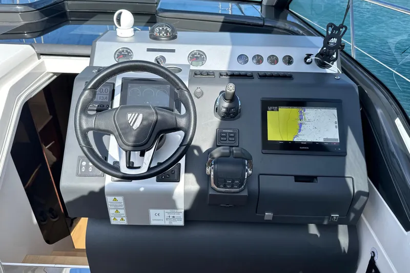  Yacht Photos Pics Cockpit of 2020 Fairline Targa 45 Open yacht with navigation controls and display.