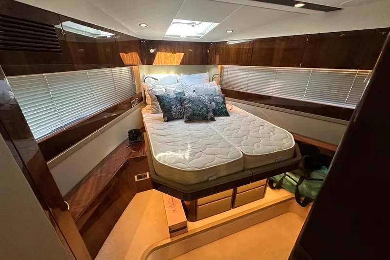  Yacht Photos Pics Luxurious cabin interior of 2020 Fairline Targa 45 Open yacht with elegant bedding.