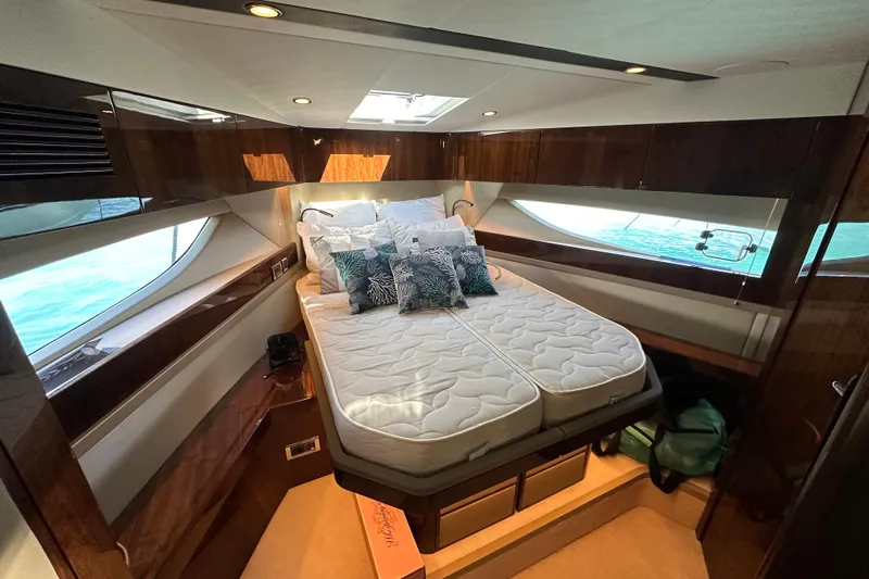  Yacht Photos Pics Luxurious cabin interior of 2020 Fairline Targa 45 Open yacht with elegant bedding.