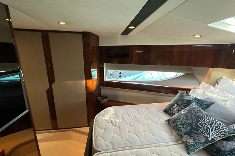 Yacht Photos Pics Luxurious cabin interior of 2020 Fairline Targa 45 Open yacht with elegant bedding.