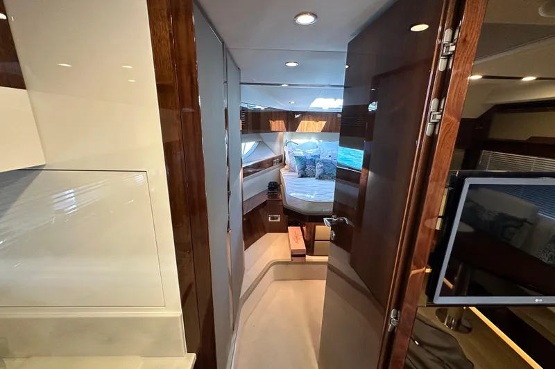  Yacht Photos Pics Luxurious interior of 2020 Fairline Targa 45 Open yacht, featuring elegant wood finishes.