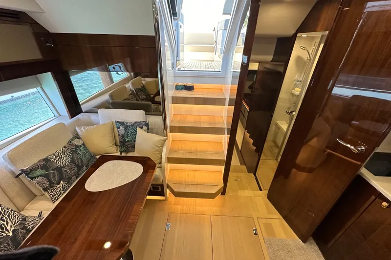  Yacht Photos Pics Luxurious interior of 2020 Fairline Targa 45 Open yacht with elegant seating and wooden finishes.