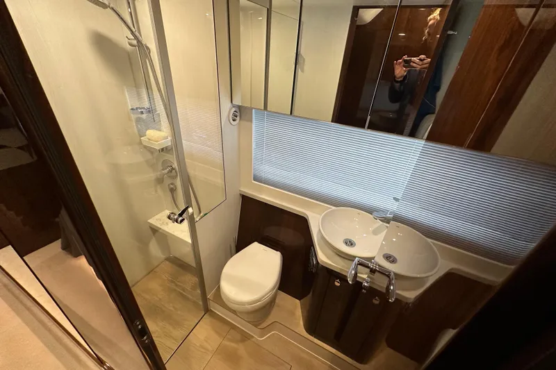  Yacht Photos Pics Luxurious bathroom in 2020 Fairline Targa 45 Open yacht with modern fixtures and dual sinks.