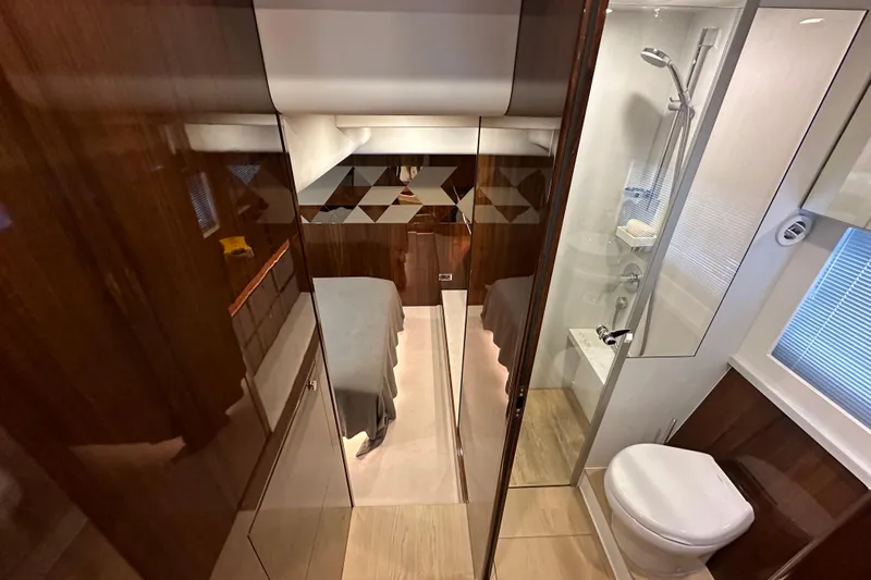  Yacht Photos Pics Luxurious interior of 2020 Fairline Targa 45 Open yacht with modern bathroom and bedroom.