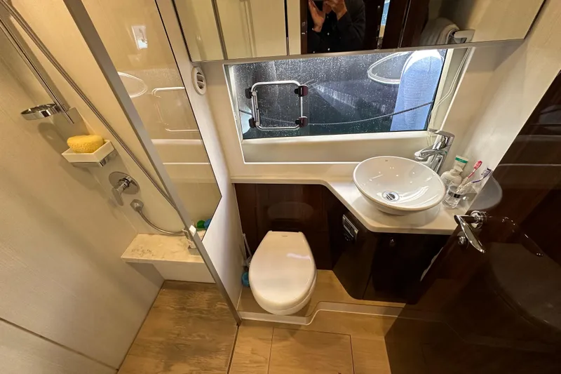  Yacht Photos Pics Luxurious bathroom in 2020 Fairline Targa 45 Open yacht with modern fixtures and elegant design.