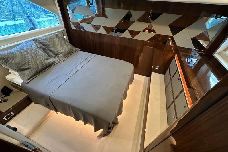  Yacht Photos Pics Luxurious bedroom interior of 2020 Fairline Targa 45 Open yacht with modern design.