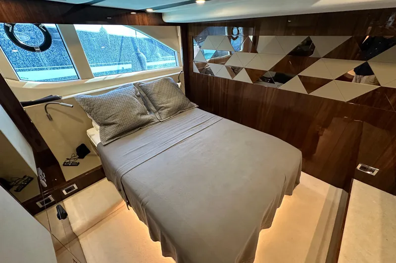  Yacht Photos Pics Luxurious cabin interior of 2020 Fairline Targa 45 Open yacht with elegant bedding.