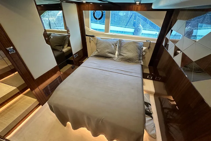  Yacht Photos Pics Luxurious cabin interior of 2020 Fairline Targa 45 Open yacht with elegant bedding.