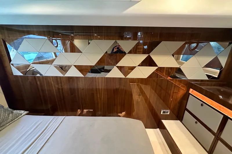  Yacht Photos Pics Luxurious cabin interior of 2020 Fairline Targa 45 Open yacht with geometric wall design.