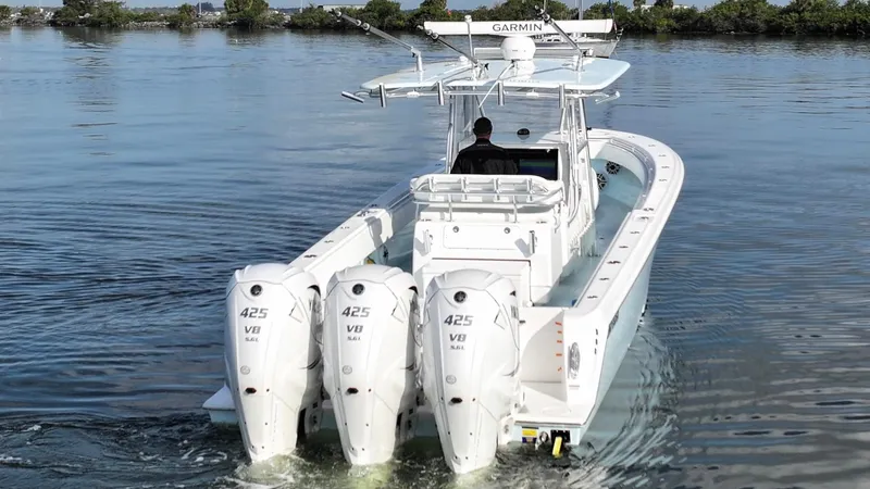  Yacht Photos Pics 2021 Contender 39 ST boat with triple 425 V8 engines on calm water.