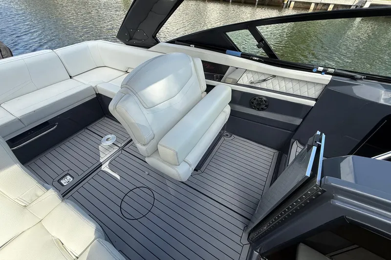  Yacht Photos Pics 2021 Cruisers Yachts 338 CX South Beach Bow Rider interior with luxurious seating and sleek design.