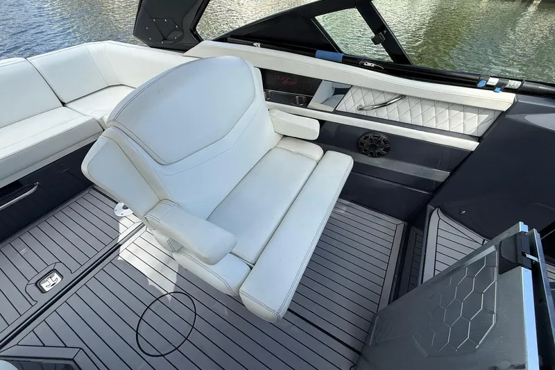  Yacht Photos Pics 2021 Cruisers Yachts 338 CX South Beach Bow Rider interior with white seating and sleek design.