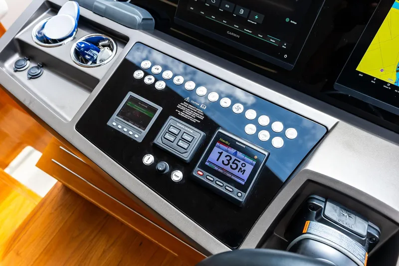 Miller Time Yacht Photos Pics Control panel of 2021 Sunseeker Manhattan 52 yacht with navigation displays.