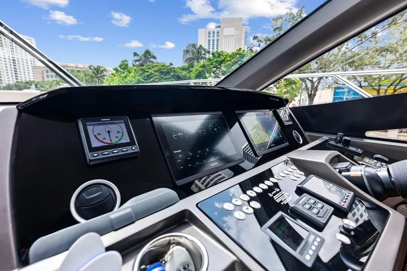 Miller Time Yacht Photos Pics Cockpit of 2021 Sunseeker Manhattan 52 yacht with advanced navigation controls.