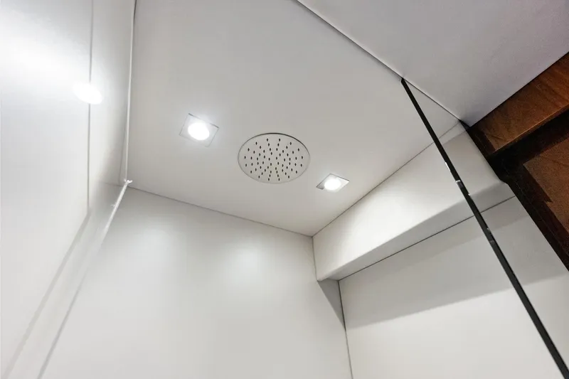 Miller Time Yacht Photos Pics Ceiling view of 2021 Sunseeker Manhattan 52 yacht interior with recessed lighting.