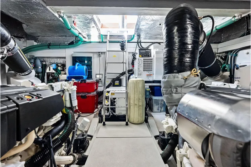 Miller Time Yacht Photos Pics Engine room of 2021 Sunseeker Manhattan 52 yacht, featuring advanced machinery and equipment.