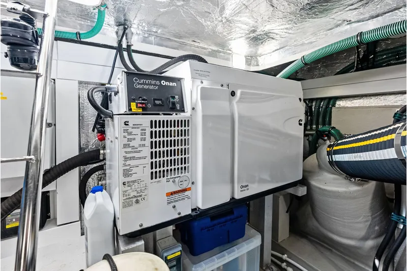 Miller Time Yacht Photos Pics Cummins Onan generator in 2021 Sunseeker Manhattan 52 yacht engine room.