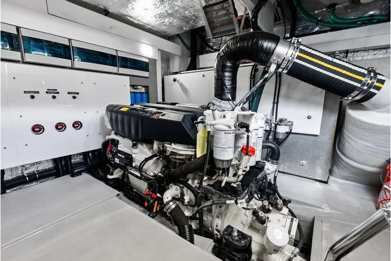 Miller Time Yacht Photos Pics Engine room of 2021 Sunseeker Manhattan 52 yacht, featuring advanced machinery and controls.