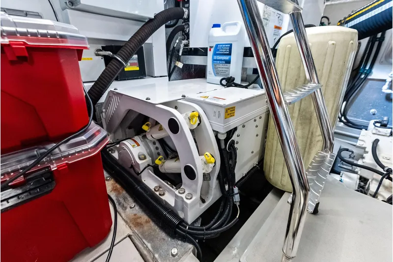 Miller Time Yacht Photos Pics Engine room of 2021 Sunseeker Manhattan 52 yacht with equipment and storage.