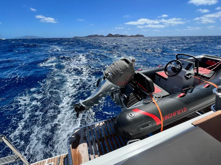 Vienna Yacht Photos Pics Fountaine Pajot Catamaran Aura 51 with Highfield dinghy on open sea, 2022 model.