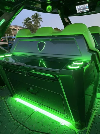 Crypto Excepted! Yacht Photos Pics Luxury Adrenaline 47 boat interior with green LED lighting, 2023 model.