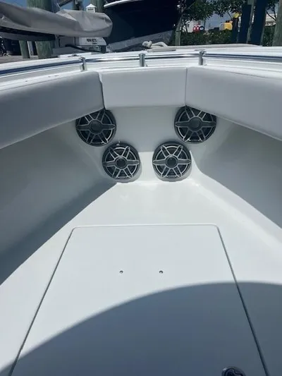  Yacht Photos Pics 2023 Contender 25 Tournament boat interior with four speakers in the bow area.
