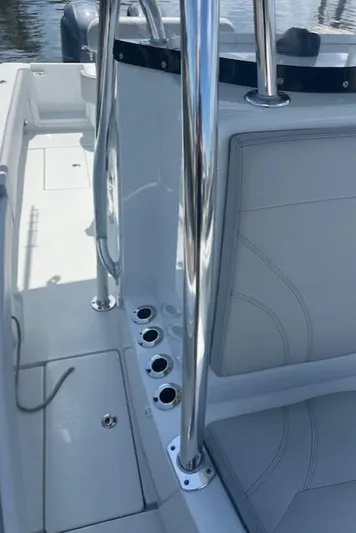  Yacht Photos Pics 2023 Contender 25 Tournament boat interior with sleek design and stainless steel features.